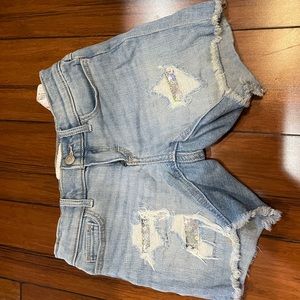 Shorts with rips and silver sequins